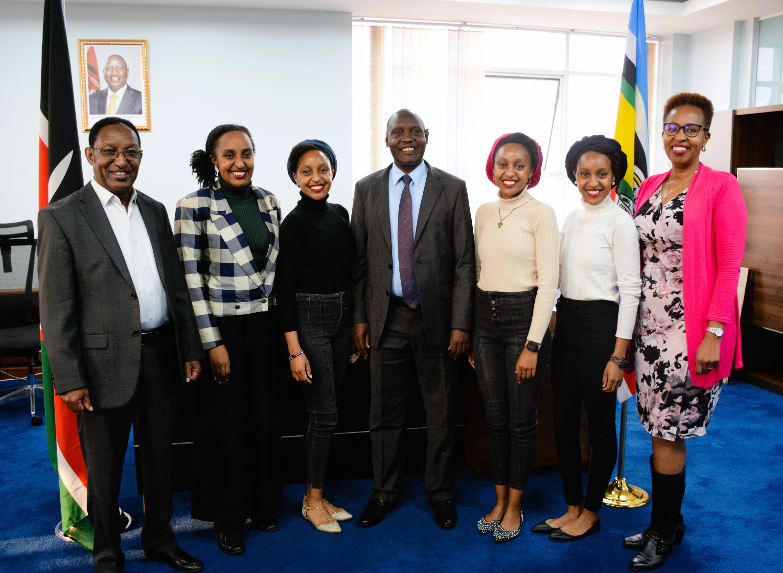 The Principal Secretary (PS), State Department for Tourism, John Ololtuaa, with Mr. and Mrs. Nicholas Moipei, with their daughters the Moipei sisters quartet, in his office today morning.