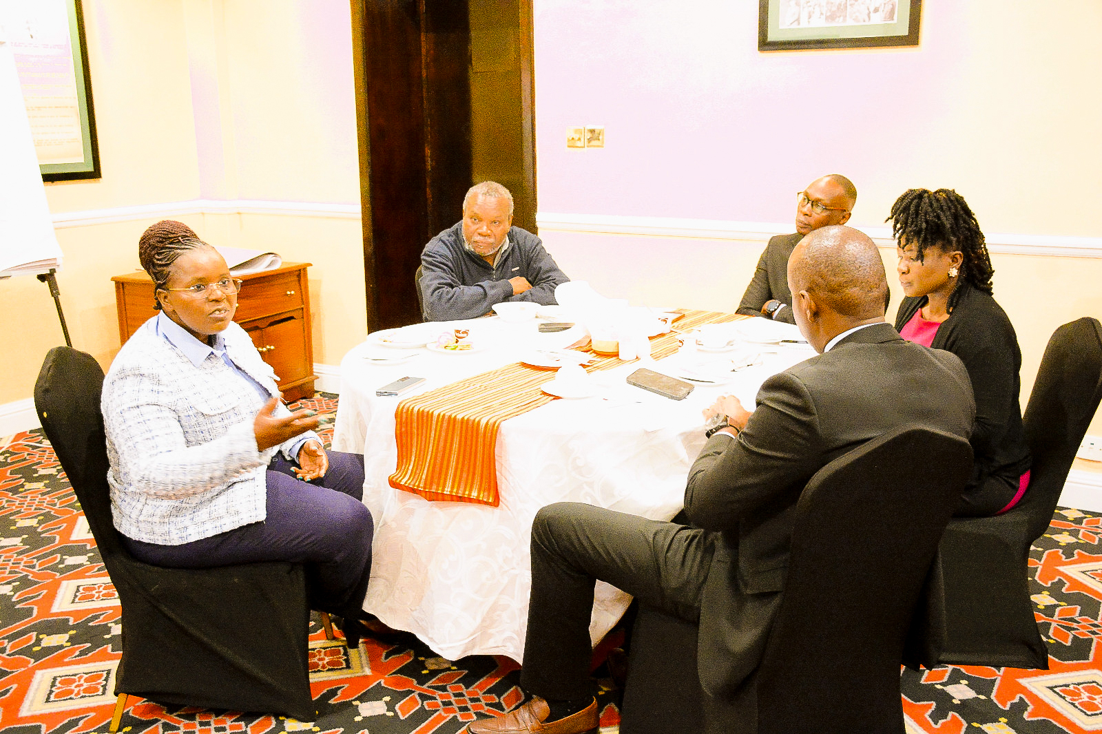 The Cabinet Secretary, Hon. Peninah Malonza, with some of the editors of the leading media houses in Kenya, during the media consultative roundtable.