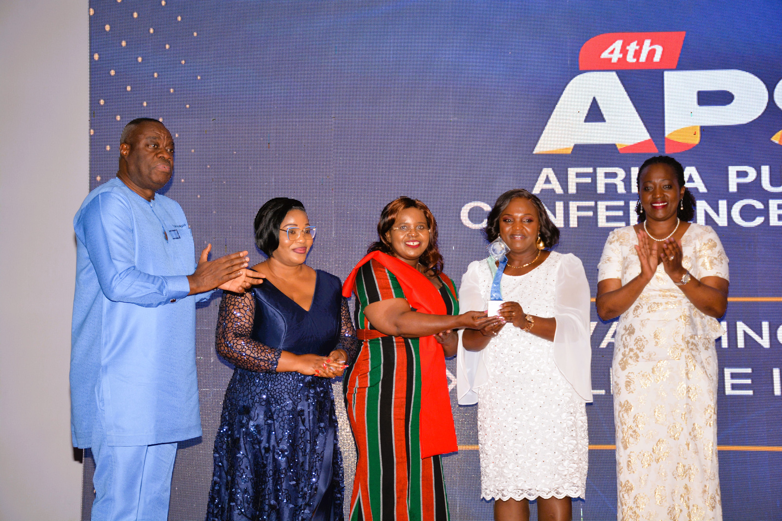 The Cabinet Secretary for Tourism, Wildlife and Heritage, Hon. Peninah Malonza (3rd from left), being awarded the Africa Tourism of the Year award by the Second Lady of the Republic of Kenya, H.E pastor Dr. Dorcas Rigathi (2nd from right).