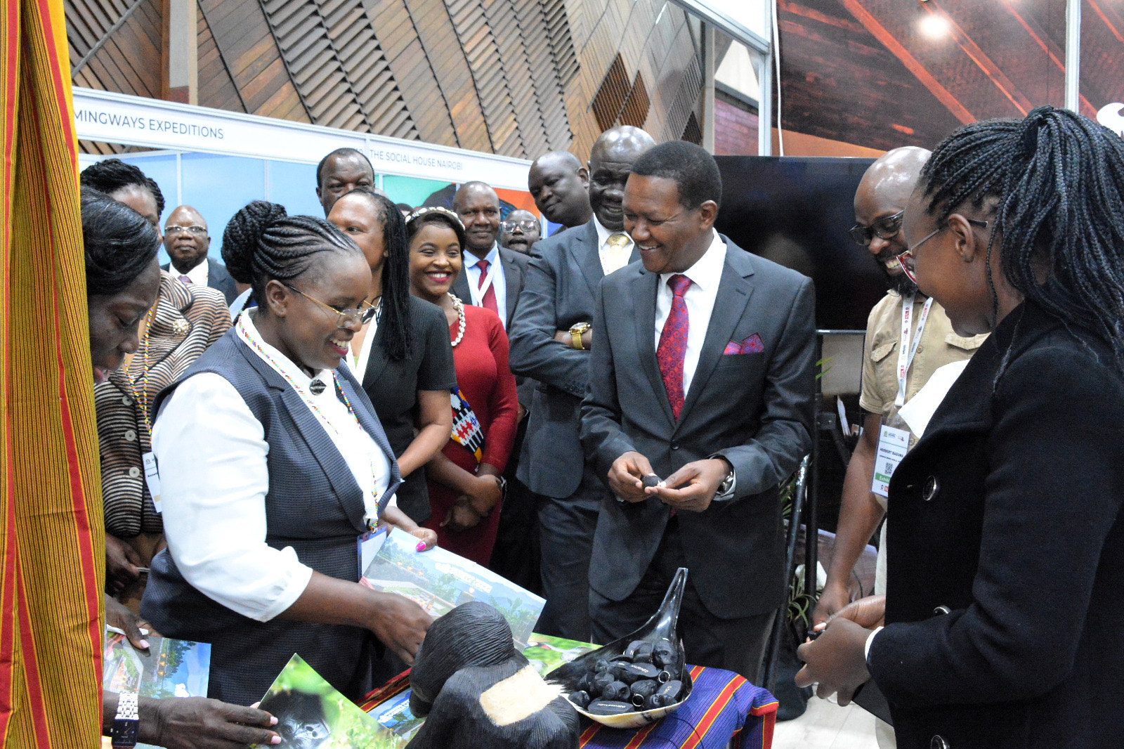 e Cabinet Secretary for Tourism and Wildlife-Kenya, Dr. Alfred Mutua (3rd from right), visiting one of the exhibitors' stalls, accompanied by the Cabinet Secretary for East African Community, the ASALs and Regional Development-Kenya, Hon. Peninah Malonza (white blouse), and other dignitaries, at the official opening of the 3rd East African Regional Tourism Expo and Magical Kenya Travel Expo, at the Kenyatta International Convention Centre.