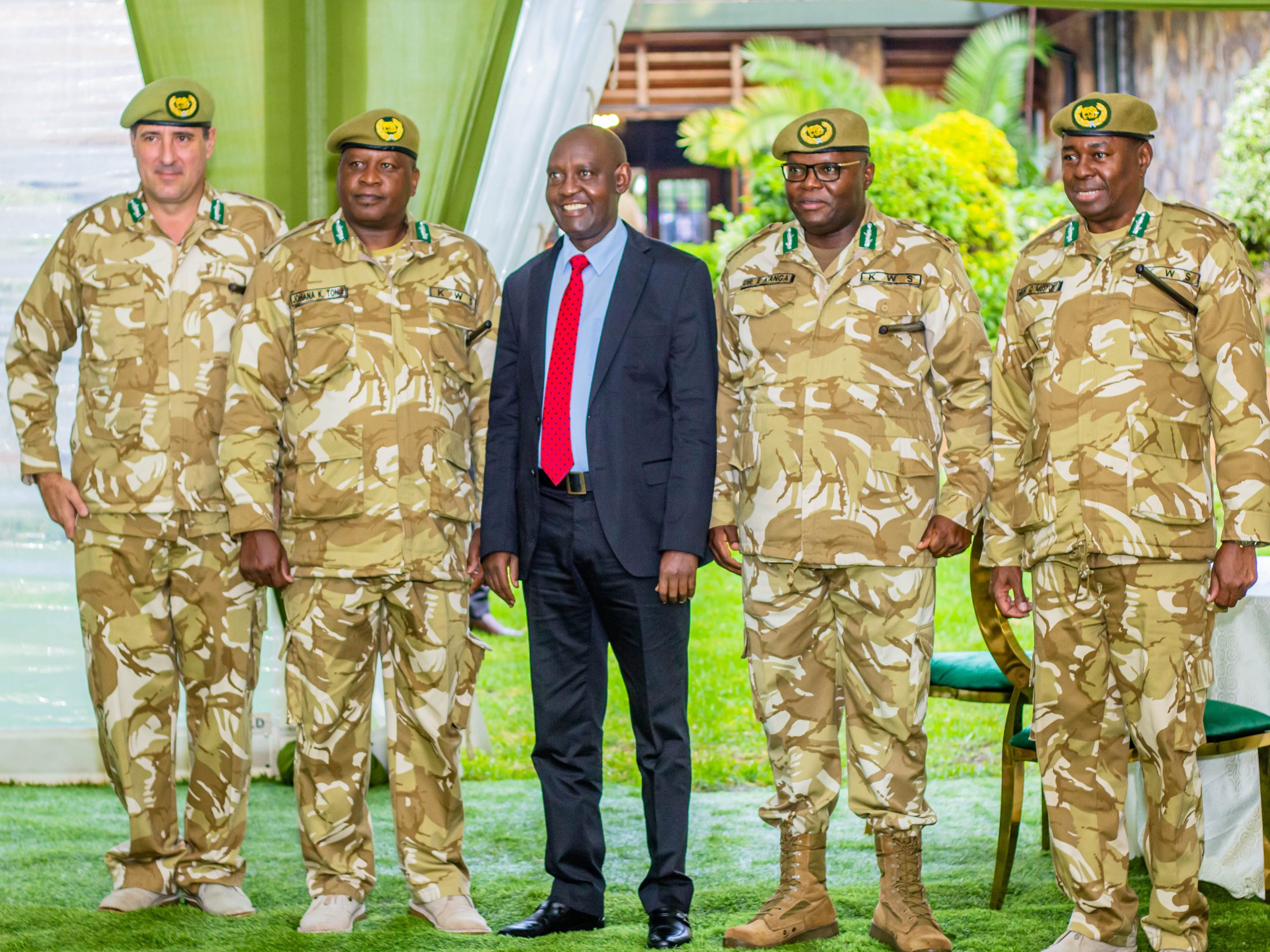 The Principal Secretary State Department for Tourism, John Ololtuaa (in Suit), with the top management of the Kenya Wildlife Service.