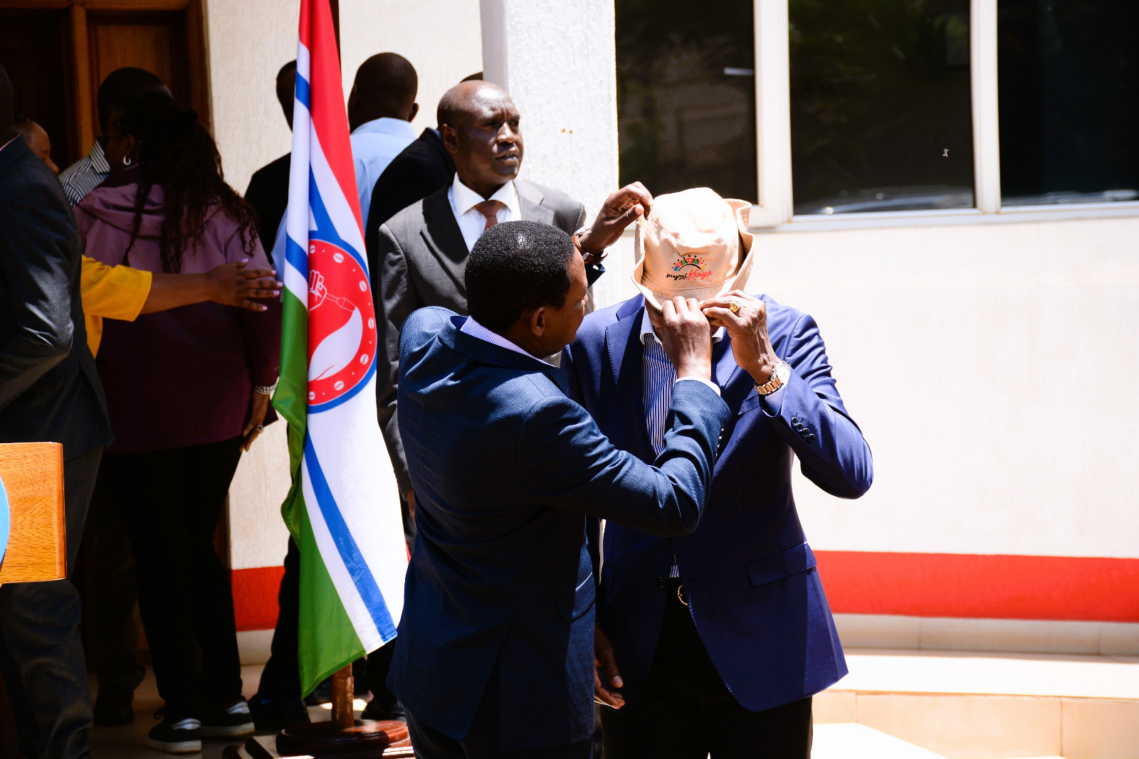 The Cabinet Secretary, Ministry of Tourism and Wildlife, Dr. Alfred Mutua (left), gifting the Kiambu County Governor, H.E. Dr. Paul Wamatangi (right).