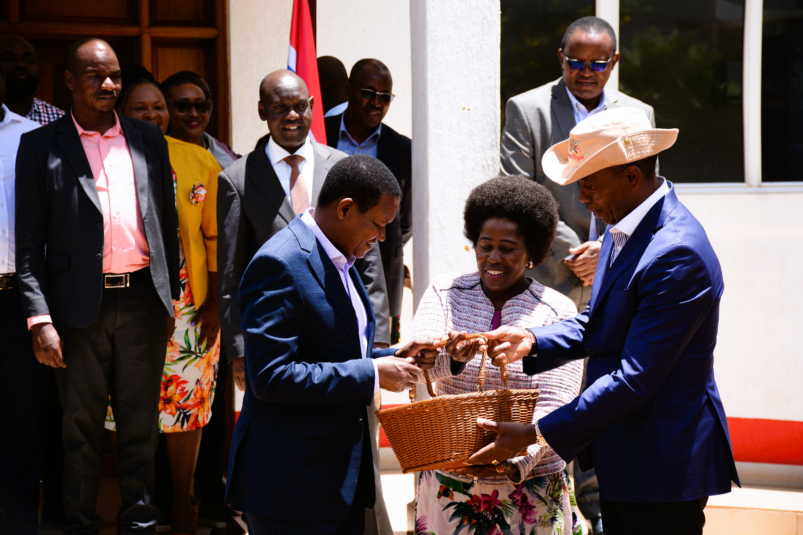 The Cabinet Secretary, Ministry of Tourism and Wildlife, Dr. Alfred Mutua (left), being gifted by the Kiambu County Governor, H.E. Dr. Paul Wamatangi (right), and the Kiambu Deputy Governor, H.E Rosemary Njeri Kirika (centre).