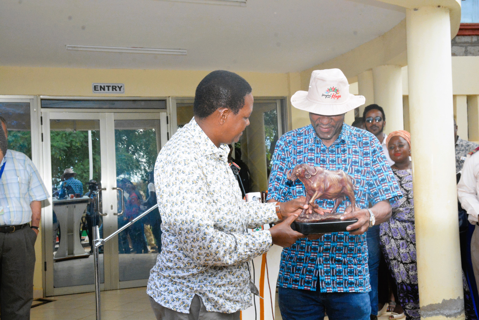 The Cabinet Secretary, Ministry of Tourism and Wildlife, Dr. Alfred Mutua (left), gifting the Governor of Taita Taveta, H.E. Andrew Mwadime (right).