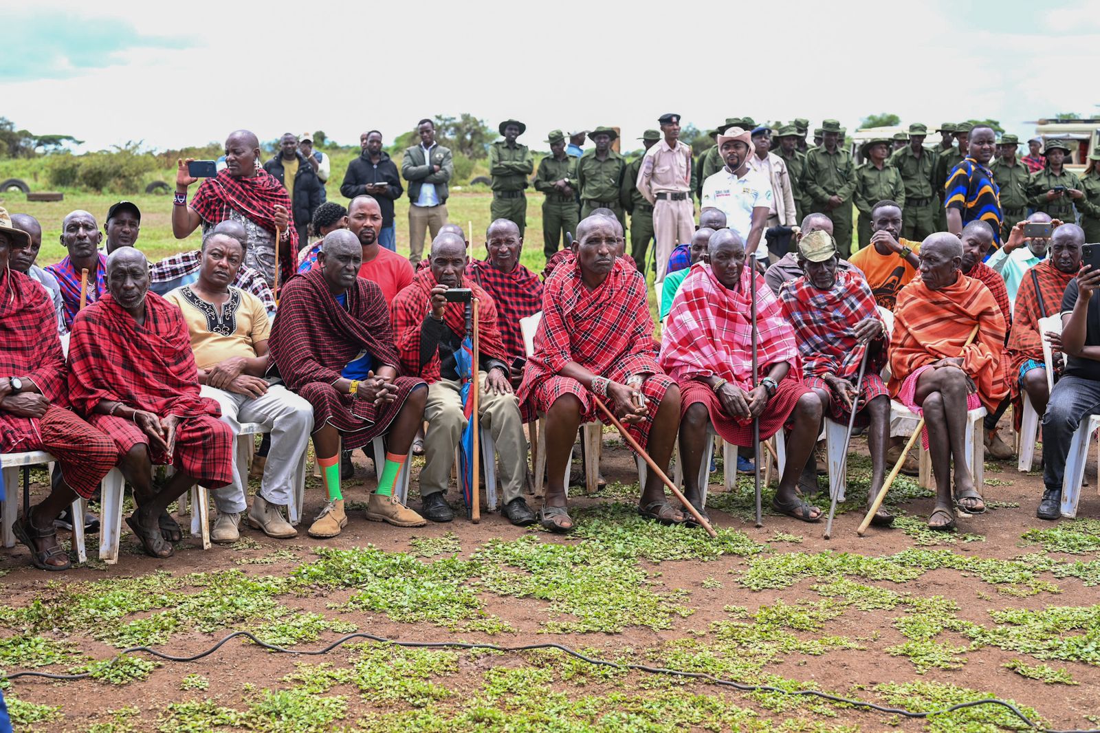 Maasai elders posing for a phto with Cabinet Secretary, Ministry of Tourism and Wildlife, Mr. Alfred Mutua.
