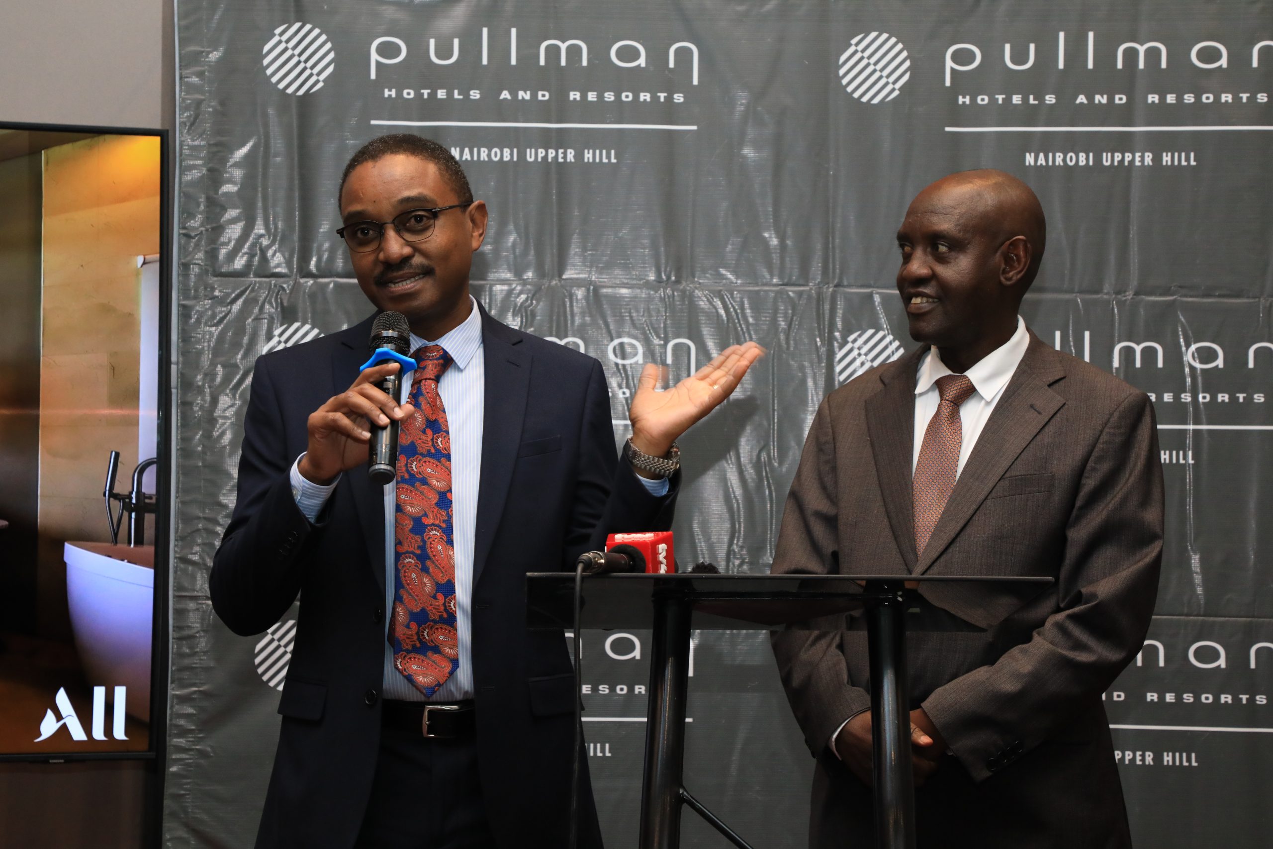 KAHC, CEO Mike Macharia (L) with PS John Ololtuaa at the official opening of pullman hotel.