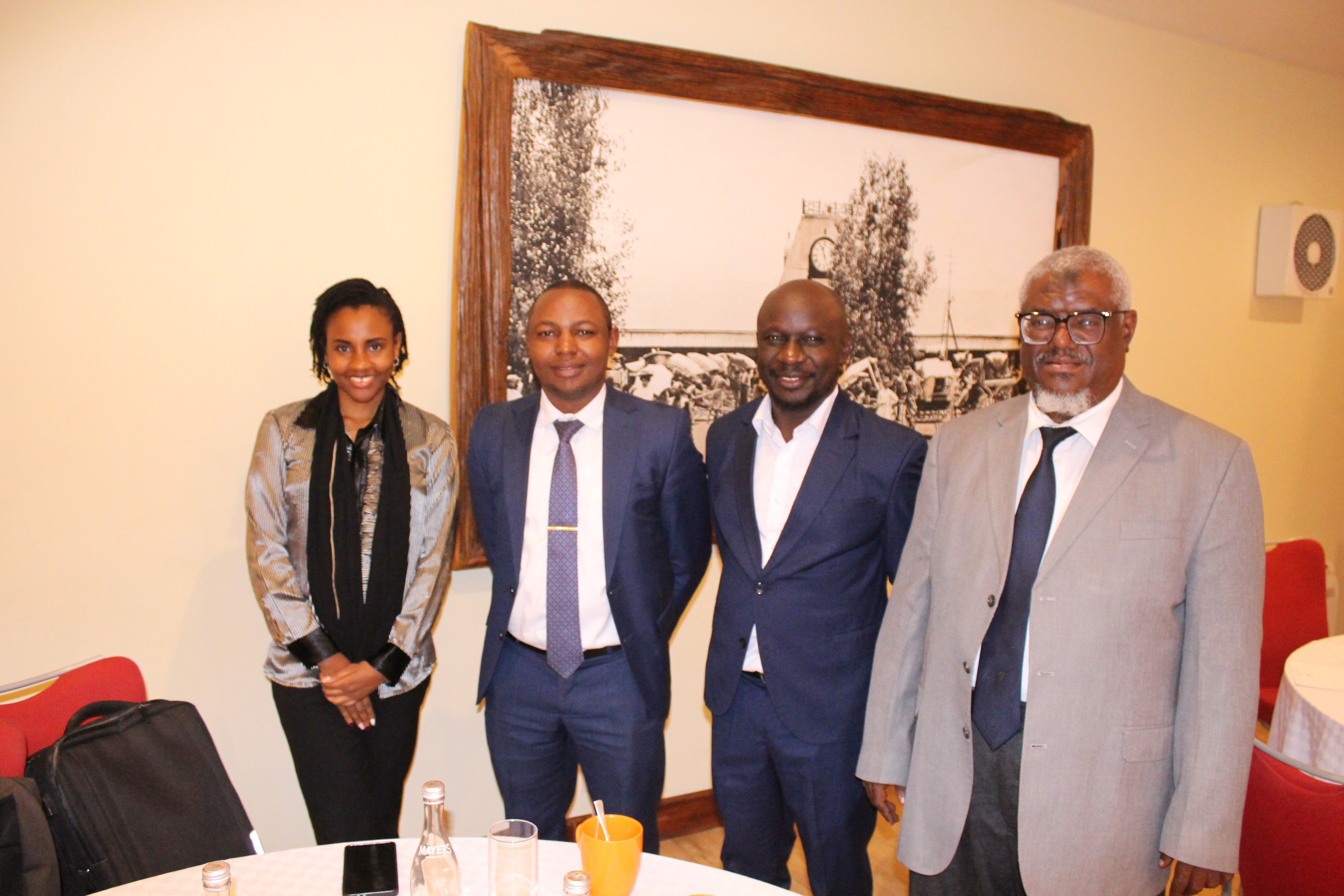 Participants take a group photo.